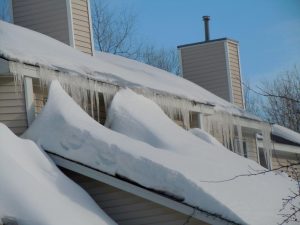 Ice Dam Removal and Rooftop Snow Removal Winnipeg Canada